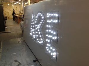 Illuminated sign with halo effect for Ace Appointments